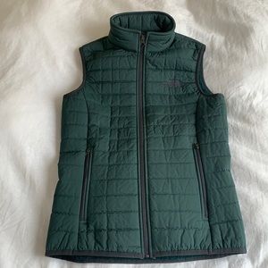 Green North Face furry vest